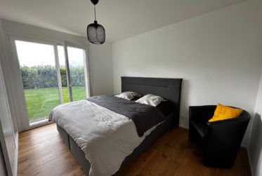 Splendide 4 pièces au rez jardin avec une terrasse et très grande pelouse privative